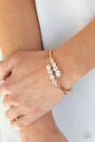 Defying Dazzle - Gold Hinge Paparazzi Bracelet